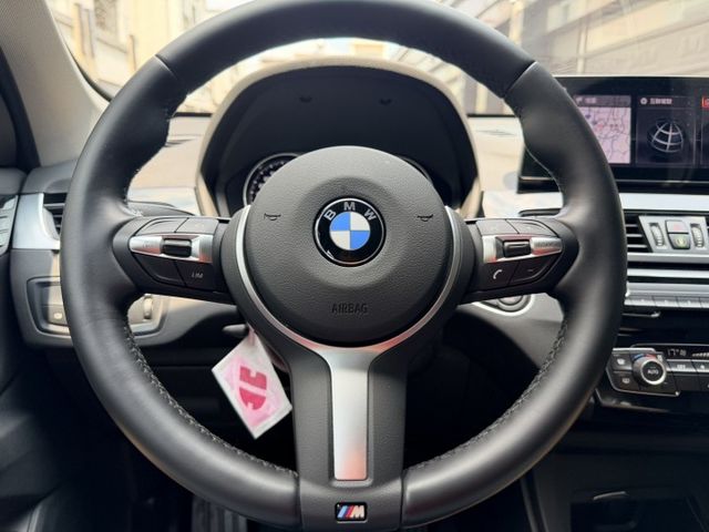 2020/21領 X1 18I 認證車 摸們/定速/M版方向盤/抬顯/電動椅/電尾門/導航/便宜/車況棉/可全額貸款  第4張相片